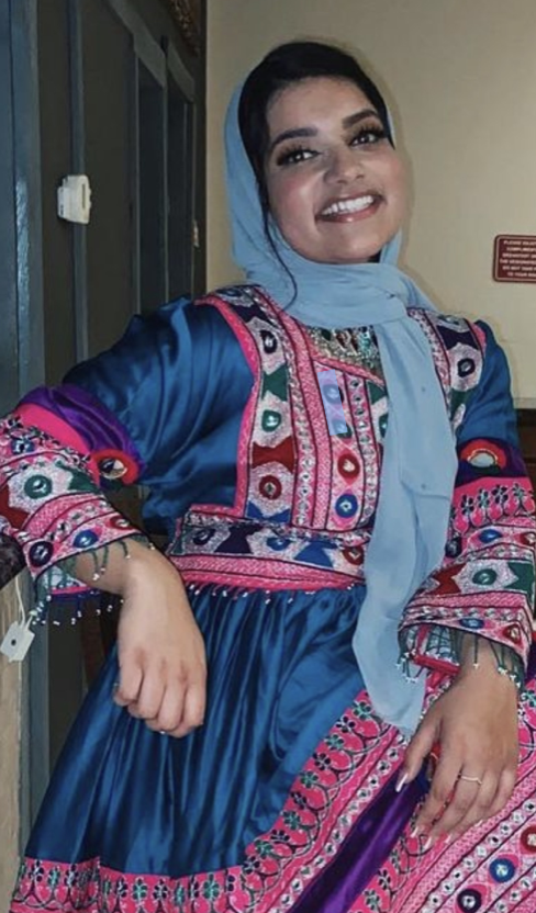 Sharifa Halimi wearing pink and blue